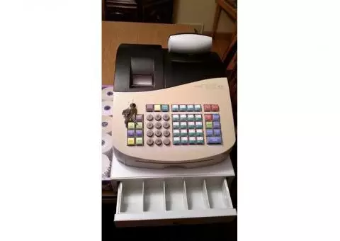 Cash Register Brand New with full case of paper roll receipts